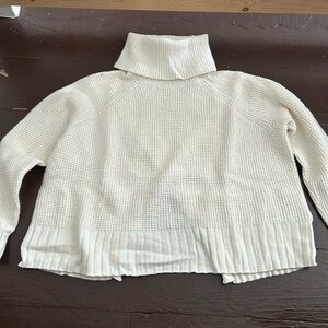 White turtleneck sweater